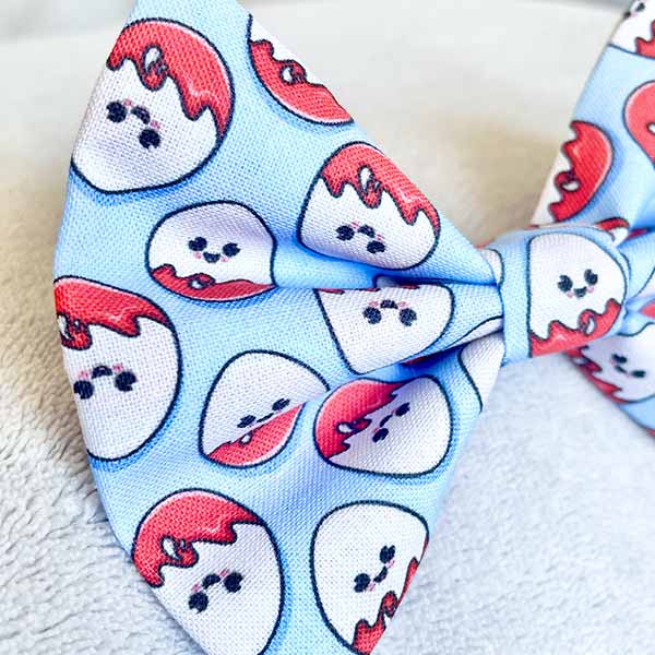 A Chocolate Egg Surprise Dog Bow Tie